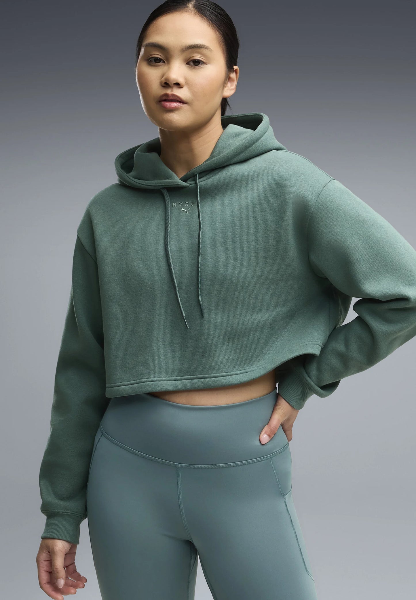 W PUMA X HYROX HEAVYWEIGHT HOODIE Herb Green
